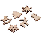Christmas tree decorated with carved plywood wood chip ornaments