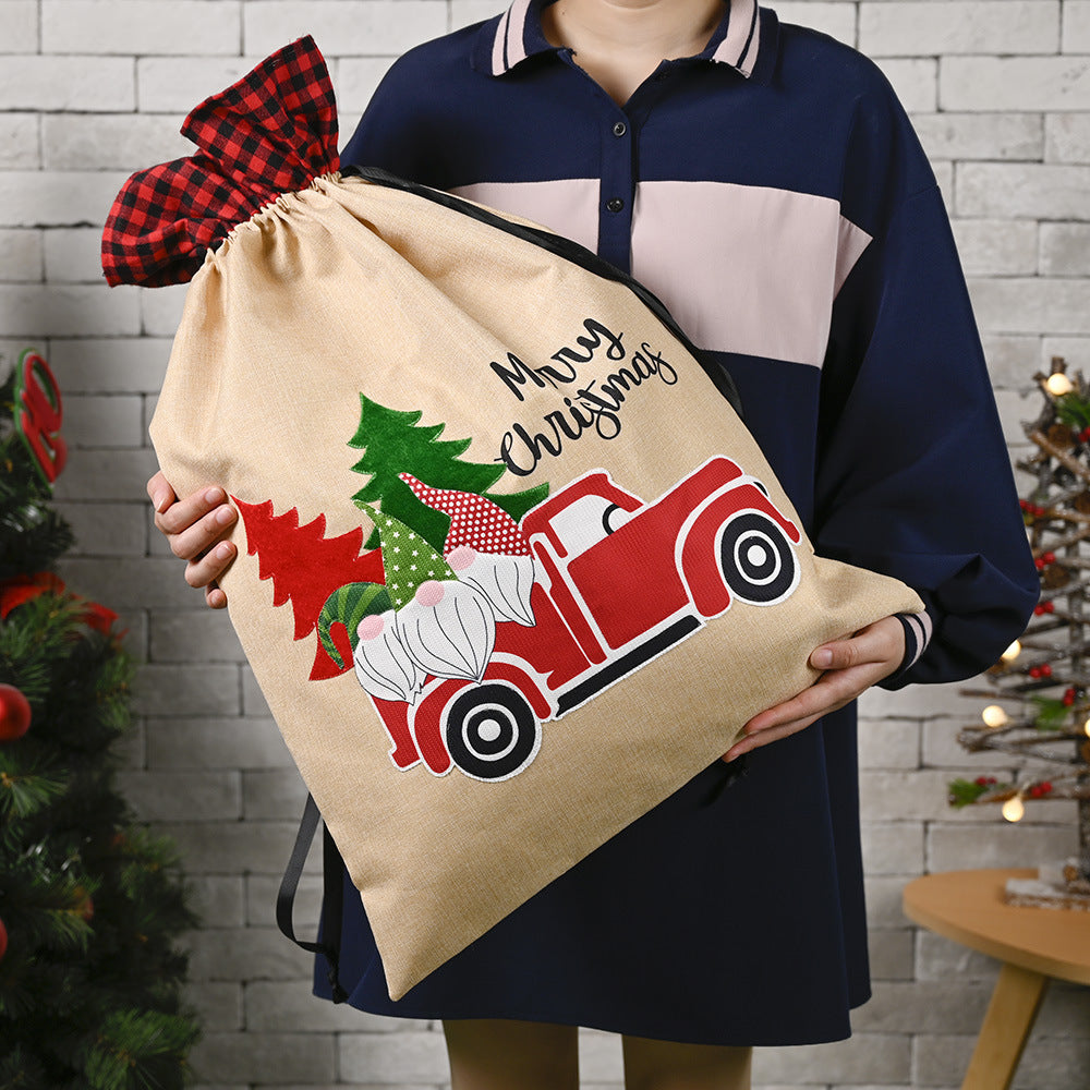 Set of Christmas gift bags with forest holiday theme arranged seasonally