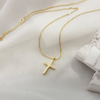 925 Sterling Silver cross pendant necklace with delicate chain on white background