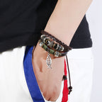 Brown leather bracelet with waxed cord details