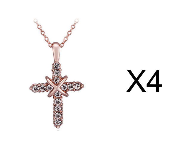 Stylish studded cross pendant hanging on display chain
