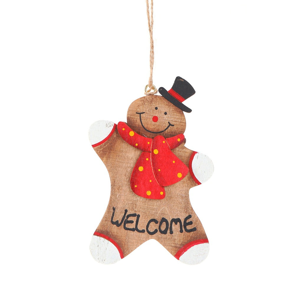 Set of wooden gingerbread man Christmas ornaments showing different designs