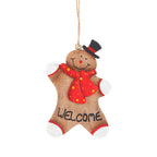 Set of wooden gingerbread man Christmas ornaments showing different designs