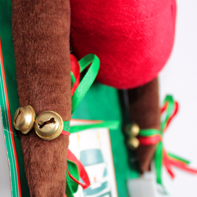 Close-up of soft flannel Christmas antlers ornament in khaki color festive detail