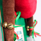 Close-up of soft flannel Christmas antlers ornament in khaki color festive detail