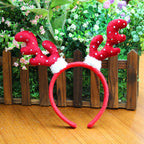 Christmas headband set featuring top hat and antlers for festive parties