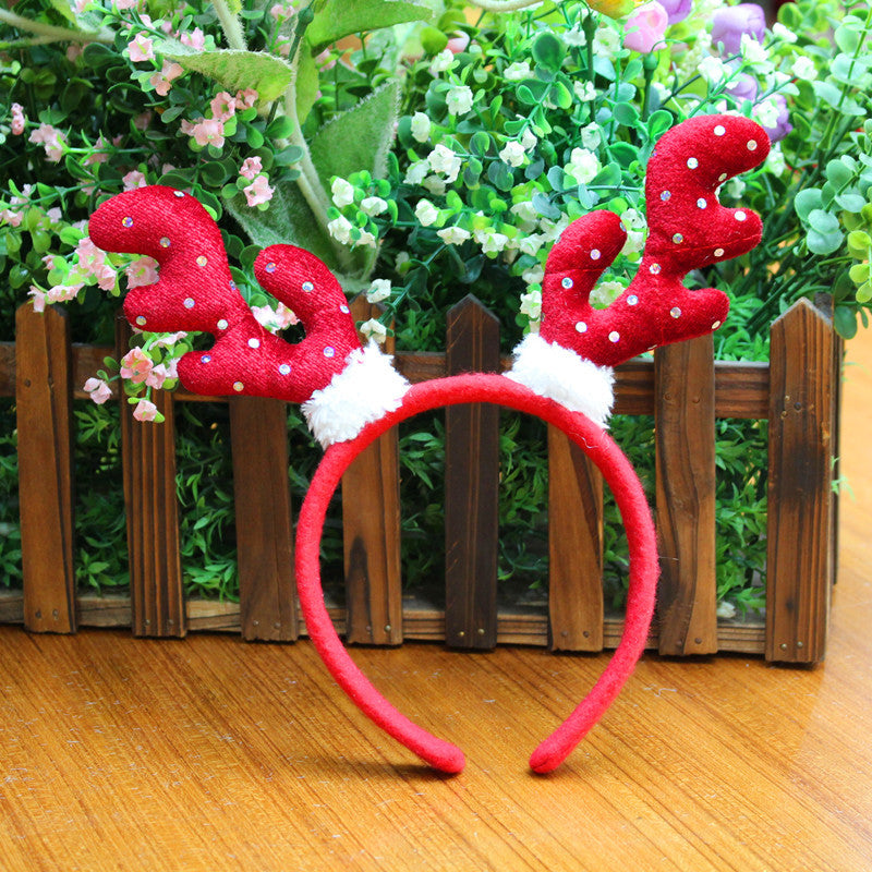 Christmas headband set featuring top hat and antlers for festive parties