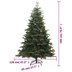 Green folding Christmas tree standing tall with natural-looking cones and berry accents