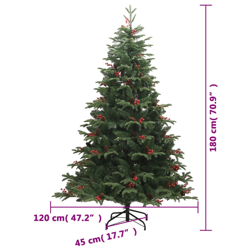 Green folding Christmas tree standing tall with natural-looking cones and berry accents