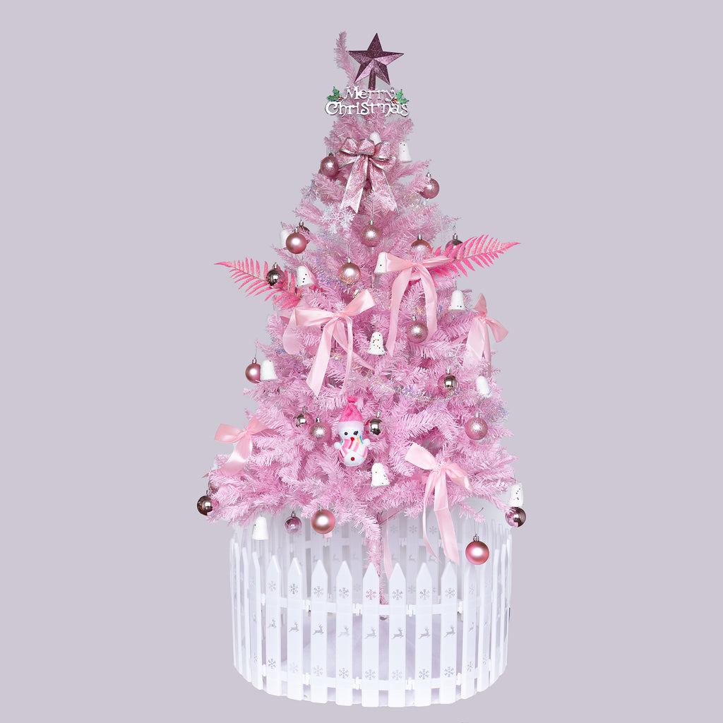 Close-up of pink PVC branches on the Christmas tree showing texture and fullness
