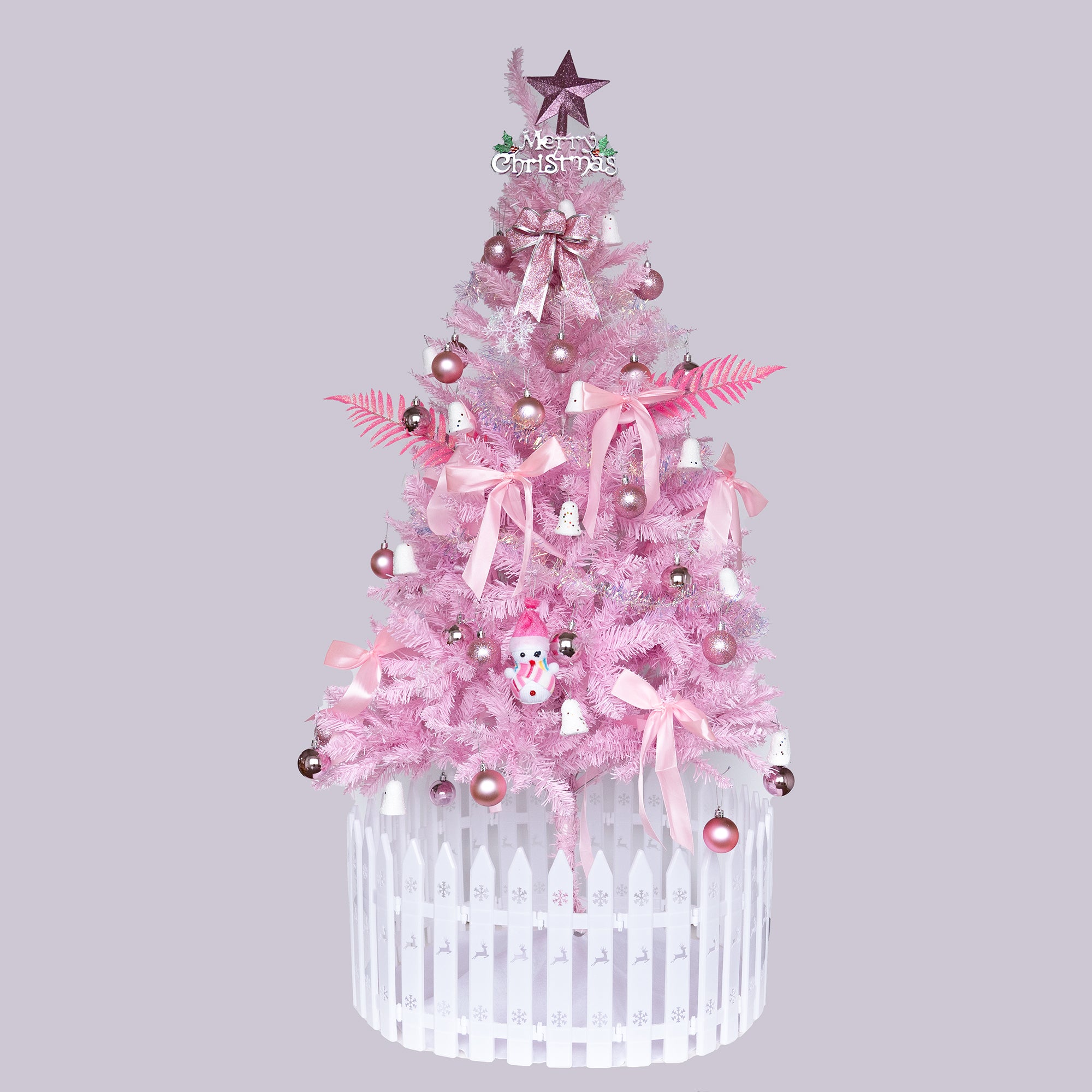 Close-up of pink PVC branches on the Christmas tree showing texture and fullness