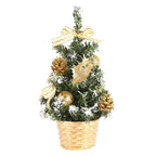 Compact artificial Christmas tree in gold color for desktop holiday display