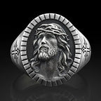 Men's ring showing cross and religious symbolism
