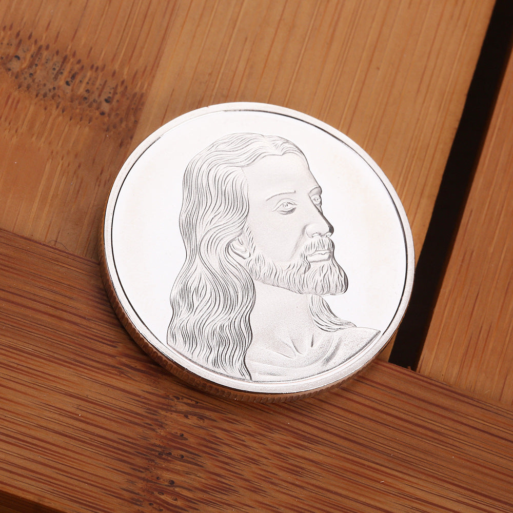 Jesus commemorative coin with sacred imagery on front