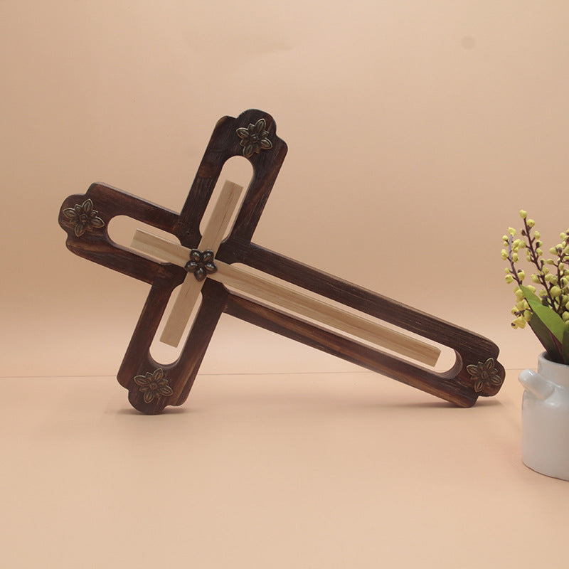 Decorative cross featuring hand-painted religious pattern