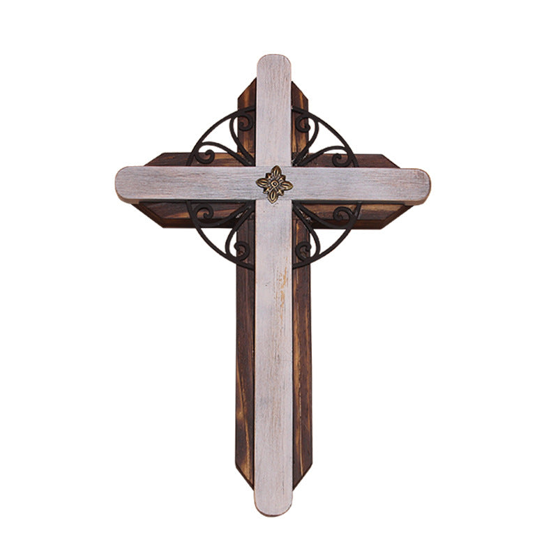 Close-up of wooden cross pendant showing apricot grain texture and craftsmanship