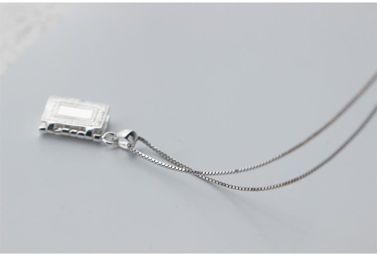 Faith-inspired cross pendant in silver-tone metal design