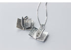 Cross pendant featuring faith-inspired design for believers