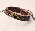 Close-up view of leather twine bracelet with Christian fish symbol for daily faith expression