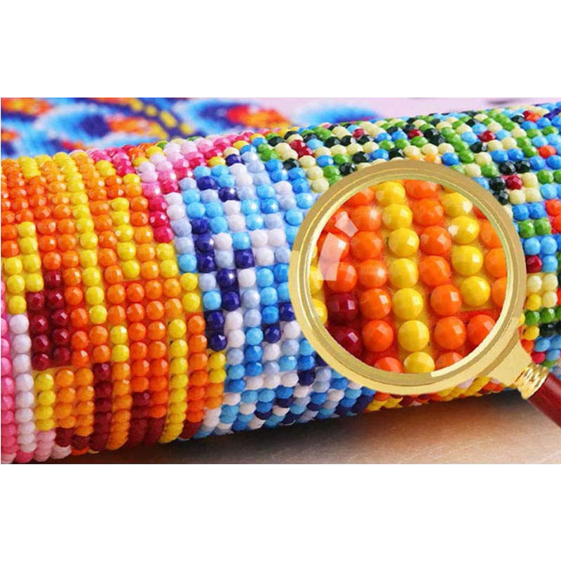 Close-up of colorful resin rhinestones arranged in diamond painting pattern