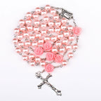 Cross necklace displayed on elegant jewelry stand