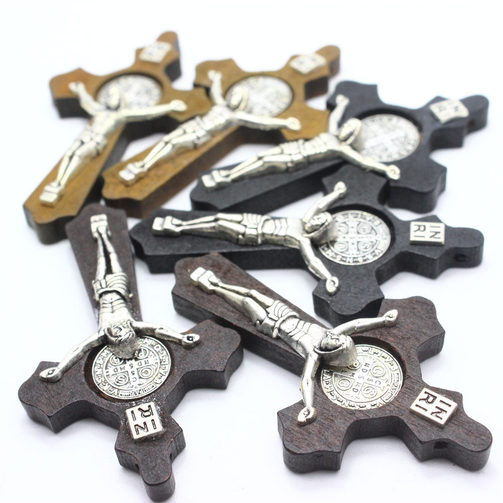 Close-up of INRI inscription on Christian cross pendant