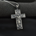 Jesus cross necklace laid flat showing horsewhip chain style