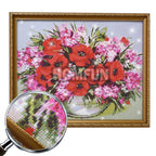 Finished diamond painting artwork featuring the sacred cross for wall display