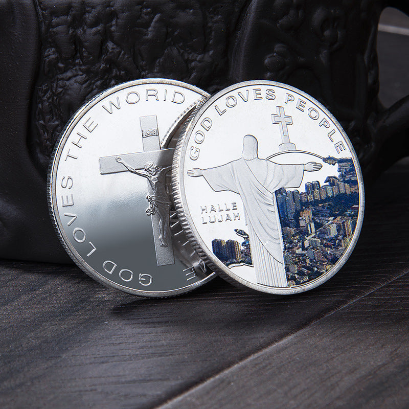 Flat lay of embossed religious commemorative medal showing full design
