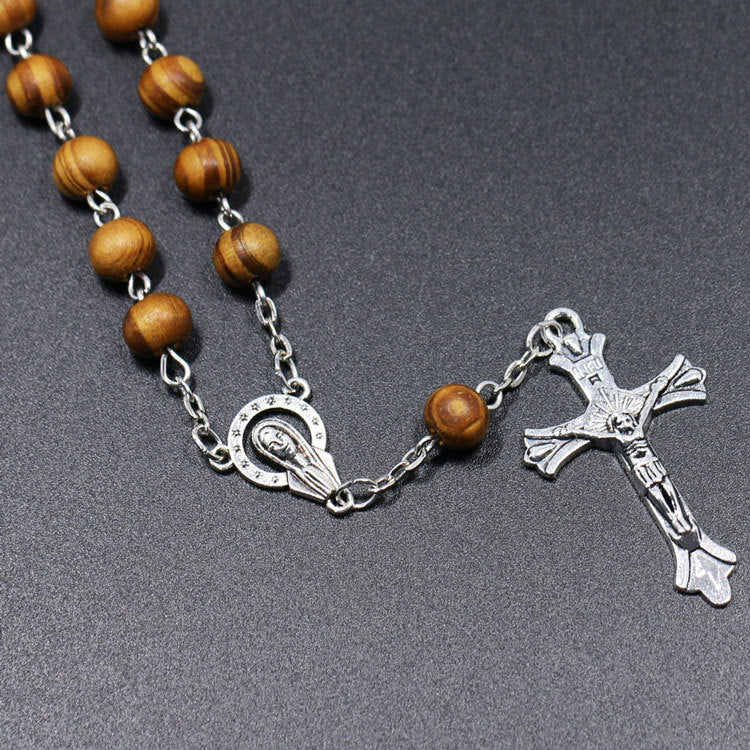 Wooden rosary bracelet styled for everyday faith wear