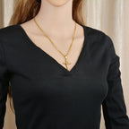 Classic stainless steel cross pendant representing Christian hope and redemption