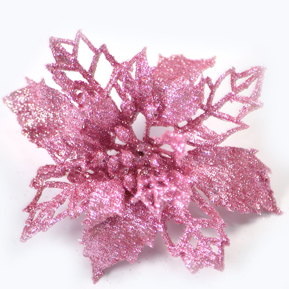 Christmas flower decoration displayed with holiday greenery