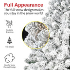 Assembled flocked Christmas tree decorated with red ribbon and ornaments
