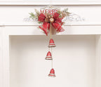 Festive bell ornament with tree design detail