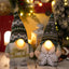 Festive Christmas nose decoration with twinkling lights on textured background