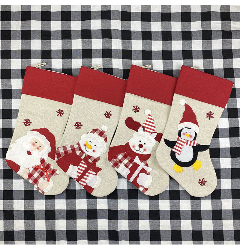 Festive cross Christmas stocking decoration in rich red velvet fabric