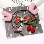 Close-up of soft cloth Christmas decorative pieces arranged artistically