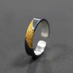 Adjustable open band detail of men's cross ring
