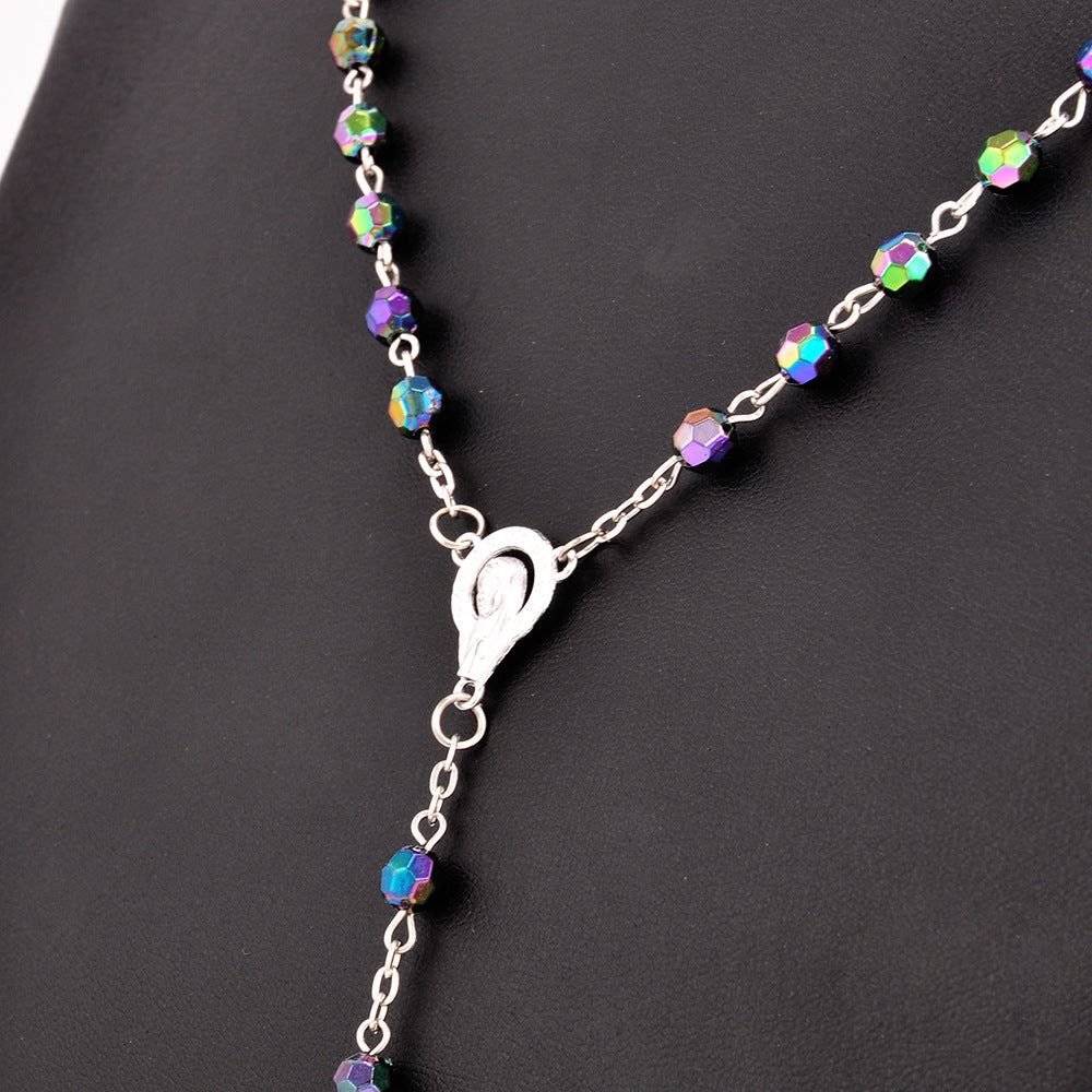 Colorful horn bead rosary necklace with alloy crucifix pendant displayed against a warm background Main image