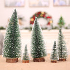 Small green and white pine needle Christmas tree decoration on white background