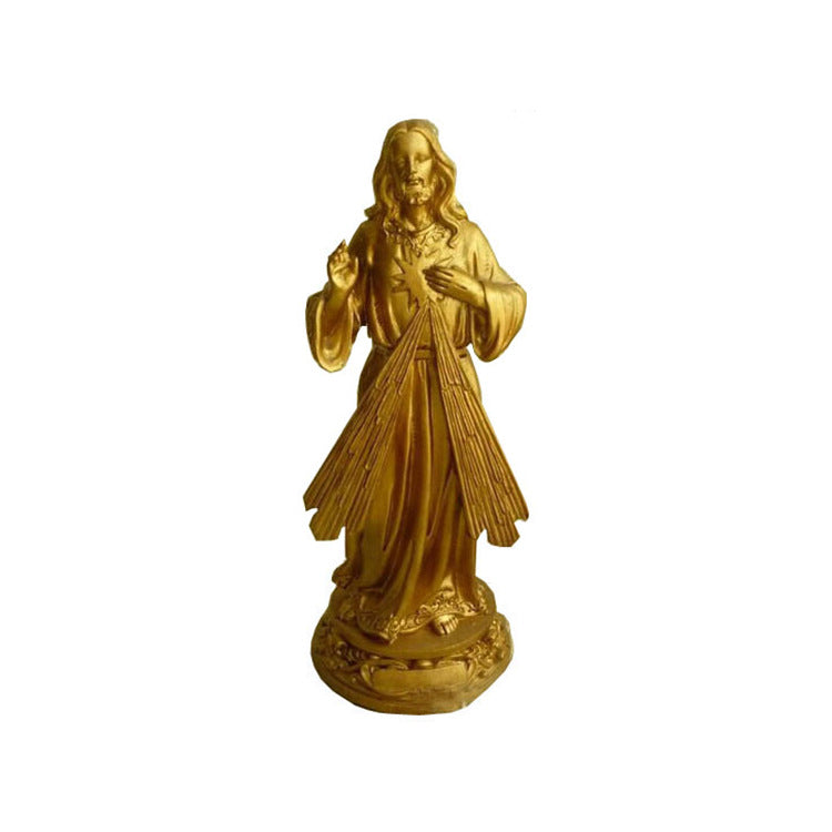 Divine Mercy sculpture with radiant gold coloring and serene expression
