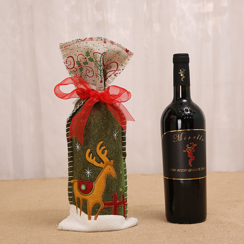 Festive Christmas wine bottle cover with ribbon snowman design for holiday celebrations