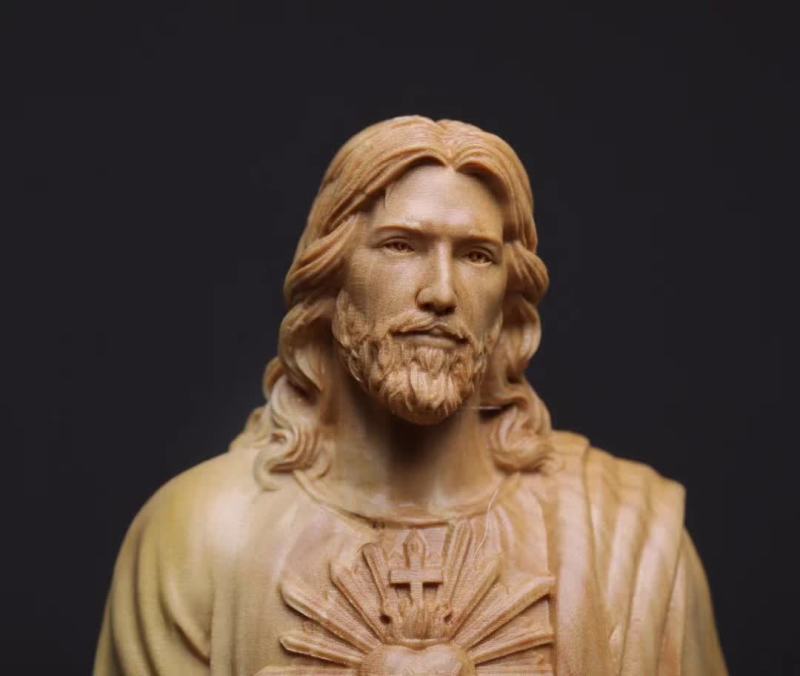 Close-up detail of boxwood grain texture on carved ornament