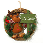 Christmas wreath with burlap and rattan details on rustic door