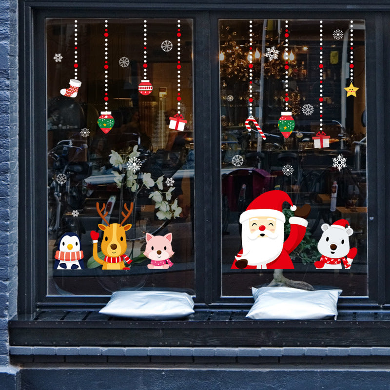 Christmas wall sticker placed in home window for seasonal celebration