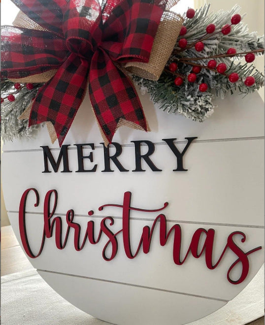 Close-up of wooden pendant Christmas decoration with warm holiday lighting