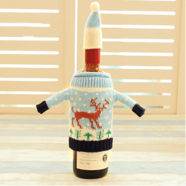 Set of four knitted Christmas bottle covers in various festive designs