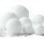Pure white foam snowball Christmas ornaments arranged in a cluster