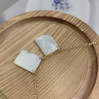 Elegant Figaro chain necklace with mother of pearl Virgin Jesus pendant