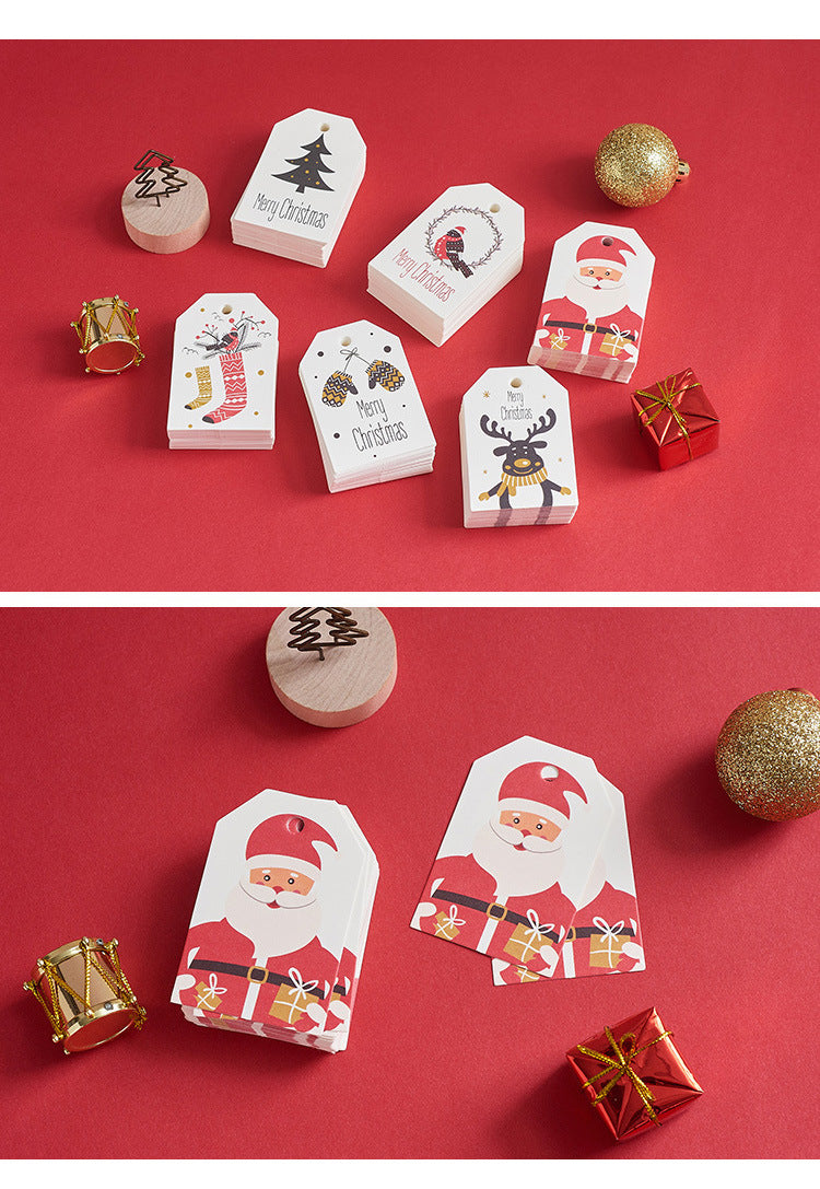 Festive paper decorations with deer and holiday motifs